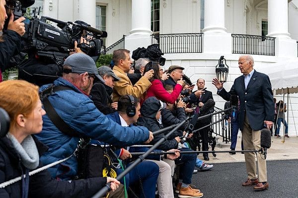 Joe Biden speaks to the press as he and First Lady Jill Biden board Marine One on the South Lawn of the White House, Monday, Oct. 3, 2022, en route to Joint Base Andrews for their trip to Puerto Rico. (Official White House photo by Cameron Smith)