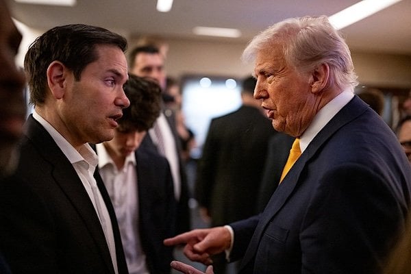 U.S. Secretary of State Marco Rubio talks with President Donald Trump at the UFC 314 in Miami, Florida, Saturday, April 12, 2025 (Official White House photo)