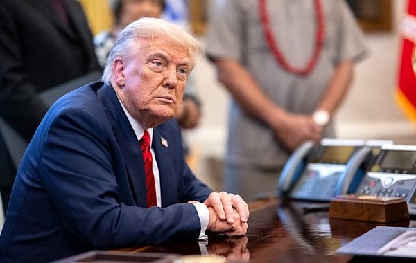 President Donald Trump signs executive orders, Thursday, April 17, 2025, in the Oval Office. (Official White House photo by Molly Riley)