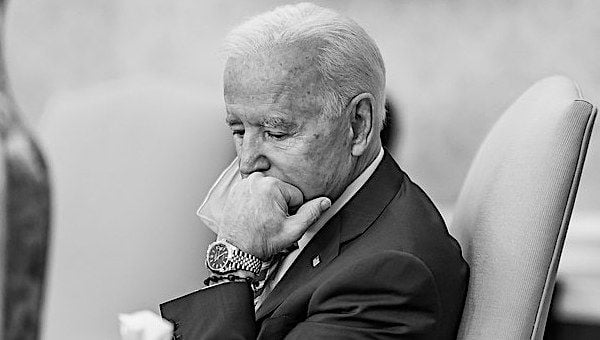 Joe Biden listens during a weekly personnel meeting Thursday, Feb. 4, 2021, in the Oval Office of the White House. (Official White House photo by Adam Schultz)
