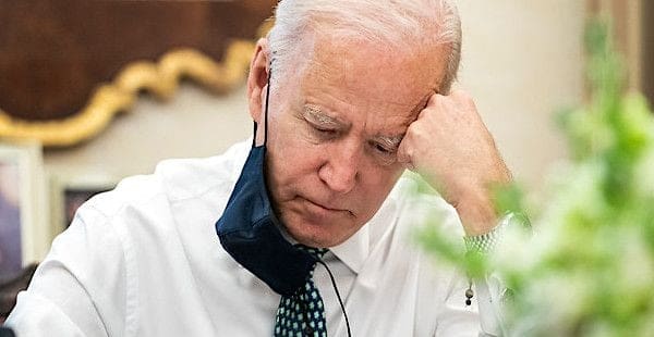 Joe Biden takes notes during a briefing on the shootings in Atlanta Wednesday, March 17, 2021, in the Oval Office Dining Room of the White House. (Official White House photo by Adam Schultz)