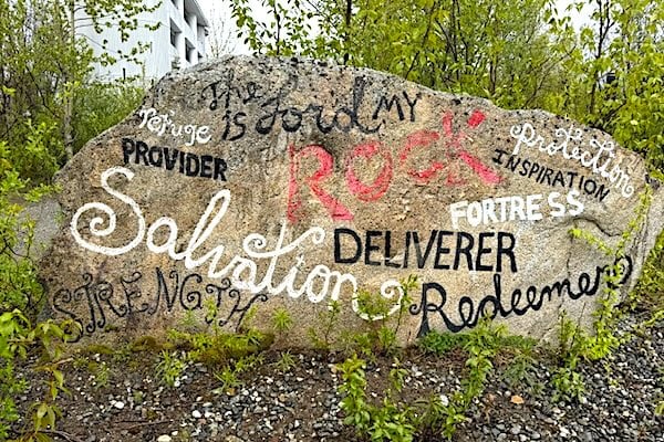 A giant rock in Hatcher Pass, Alaska, declares biblical descriptions of God on Saturday, June 7, 2025 (Photo by Joe Kovacs)