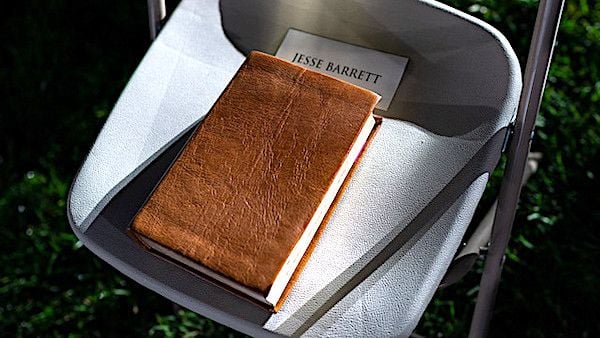 The Barrett family Bible is seen on Jesse Barrett's seat before the swearing-in ceremony of his wife, Judge Amy Coney Barrett, as Supreme Court associate justice Monday, Oct. 26, 2020, on the South Lawn of the White House. (Official White House photo by Andrea Hanks)