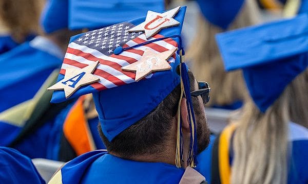 Joe Biden delivers the commencement address at his alma mater, the University of Delaware, for the Class of 2022 at Delaware Stadium in Newark, Delaware, Saturday, May 28, 2022. (Official White House photo by Adam Schultz)