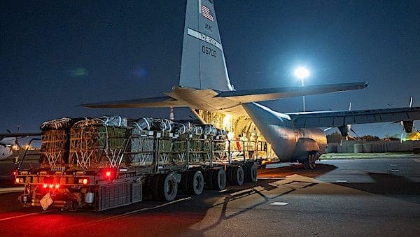 Over 38,000 meals ready to eat and water destined for an airdrop over Gaza are loaded aboard a U.S. Air Force C-130J Super Hercules at an undisclosed location in Southwest Asia on Friday, March 1, 2024. (U.S. Air Force photo)