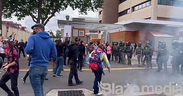ICE officers use teargas, make arrests in Portland * WorldNetDaily * by WND Staff