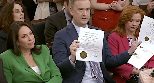 Peter Doocy of Fox News asks a question of White House Press Secretary Karoline Leavitt