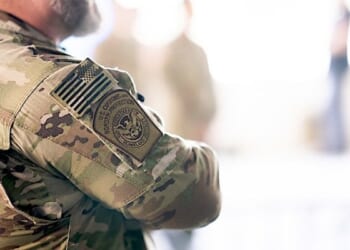 Secretary of Homeland Security Kristi Noem visits with officers from U.S. Immigration and Customs Enforcement, U.S. Customs and Border Protection, and the Federal Protective Service at the ICE facility in Portland, Oregon, to observe enforcement operations, Tuesday, Oct. 7, 2025. (DHS photo by Tia Dufour)