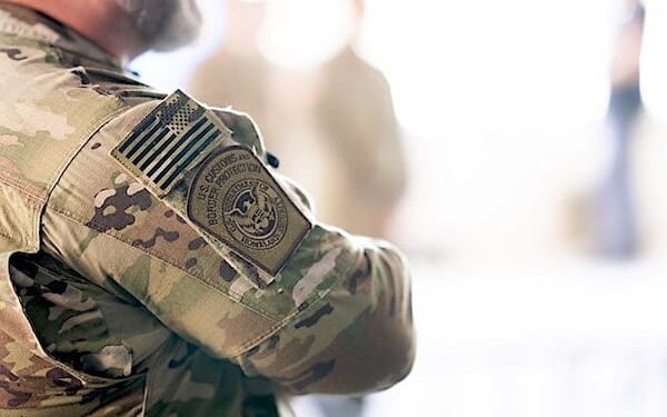 Secretary of Homeland Security Kristi Noem visits with officers from U.S. Immigration and Customs Enforcement, U.S. Customs and Border Protection, and the Federal Protective Service at the ICE facility in Portland, Oregon, to observe enforcement operations, Tuesday, Oct. 7, 2025. (DHS photo by Tia Dufour)