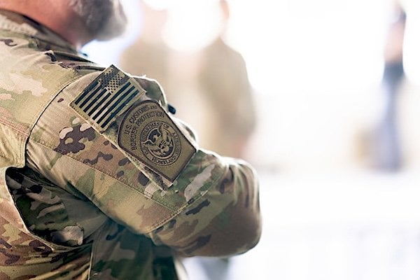 Secretary of Homeland Security Kristi Noem visits with officers from U.S. Immigration and Customs Enforcement, U.S. Customs and Border Protection, and the Federal Protective Service at the ICE facility in Portland, Oregon, to observe enforcement operations, Tuesday, Oct. 7, 2025. (DHS photo by Tia Dufour)
