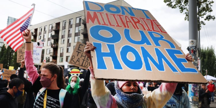 Courts Weigh Trump's National Guard Deployment Oregon, Illinois