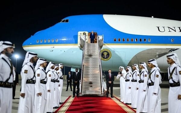 President Donald Trump awaits the arrival of Qatar's Emir Sheikh Tamim bin Hamad Al-Thani and Prime Minister and Foreign Minister Sheikh Mohammed bin Abdulrahman bin Jassim Al-Thani for a meeting aboard Air Force One during a refueling stop in Doha, Qatar, Saturday, Oct. 25, 2025. (Official White House photo by Daniel Torok)