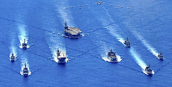 The aircraft carrier USS Ronald Reagan and the guided missile cruiser USS Antietam steam in formation with Australian and Japanese ships during a trilateral security exercise in the Philippine Sea, July 21, 2020. (U.S. Navy photo by Mass Communication Specialist 2nd Class Codie L. Soule)