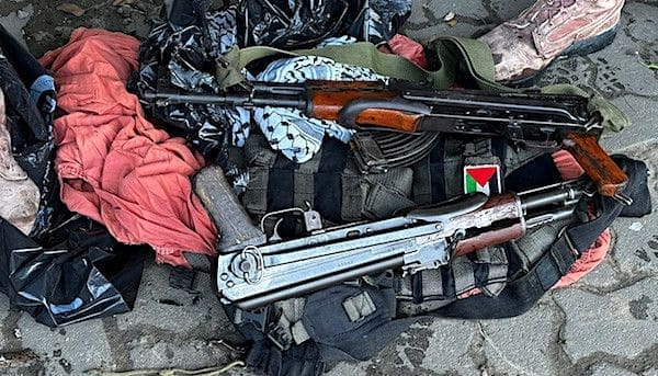 Weapons seized by Israel Defense Forces soldiers from a hospital in Khan Yunis in the Gaza Strip, Feb. 18, 2024. (IDF photo)
