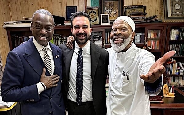 Zohran Mamdani, center, with imam Siraj Wahhaj, right