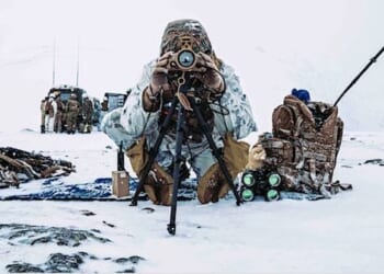 A U.S. Marine scans for simulated targets during an exercise in Setermoen, Norway, March 7, 2022, as part of Cold Response, a readiness and defense exercise. (U.S. Marine Corps photo by Sgt. William Chockey)