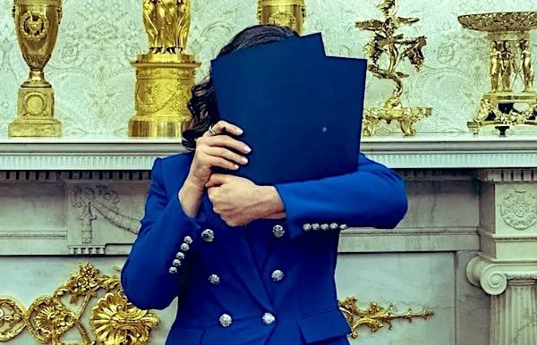 Gov. Gretchen Whitmer, D-Mich., hides her face from news media during an Oval Office meeting with President Donald Trump on Wednesday, April 9, 2025 (X)