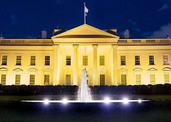 The White House is illuminated in gold light in recognition of Childhood Cancer Awareness Month, Thursday, Sept. 23, 2021. (Official White House photo by Erin Scott)
