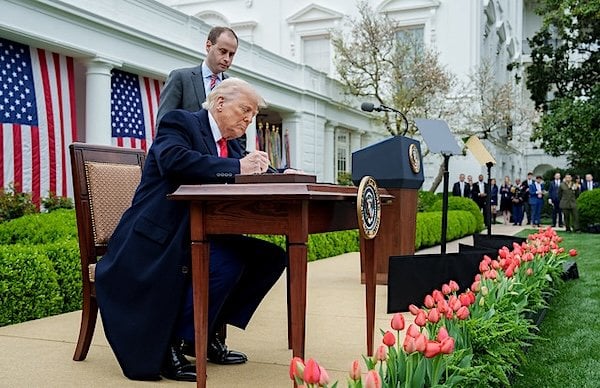 President Donald Trump signs new tariffs in the White House Rose Garden on Liberation Day, Wednesday, April 2, 2025 (Official White House photo)
