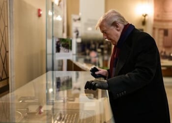 President Donald Trump looks at a display in the Memorial Display Room at Arlington National Cemetery in Arlington, Virginia during Veterans Day ceremonies, Tuesday, Nov. 11, 2025. (Official White House photo by Daniel Torok)
