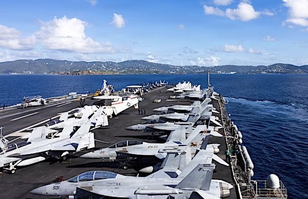 The USS Gerald R. Ford arrives at St. Thomas, U.S. Virgin Islands, Monday, Dec. 1, 2025. Military forces are deployed to the Caribbean in support of the U.S. Southern Command mission, Department of War-directed operations and President Donald J. Trump's priorities to disrupt illicit drug trafficking and protect the homeland. (U.S. Navy photo)