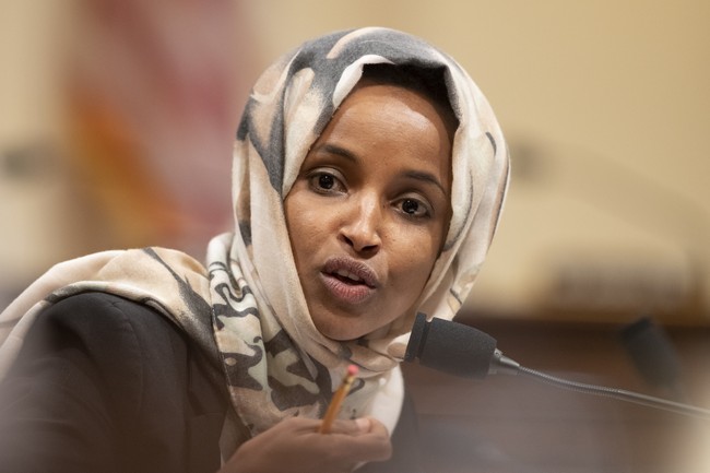 Tim Walz and Ilhan Omar Caught Posing in Damning Photos with Illegal Somali Fraudster – RedState