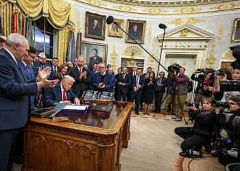 President Donald Trump signs the funding bill from Congress that reopens the government, Wednesday, Nov. 12, 2025, in the Oval Office. (Official White House photo by Joyce N. Boghosian)