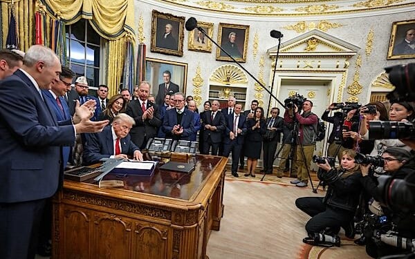 President Donald Trump signs the funding bill from Congress that reopens the government, Wednesday, Nov. 12, 2025, in the Oval Office. (Official White House photo by Joyce N. Boghosian)