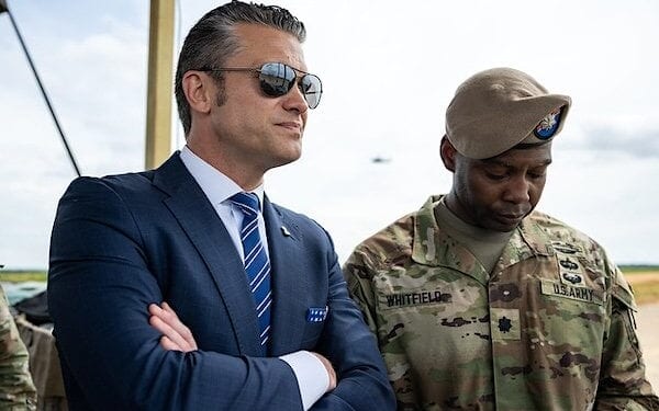 U.S. Defense Secretary Pete Hegseth, left, observes a military demonstration at Fort Bragg, North Carolina, on Tuesday, June 10, 2025, during a visit to commemorate the 250th anniversary of the U.S. Army. (Official White House photo by Daniel Torok)