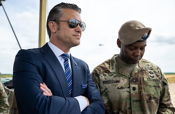 U.S. Defense Secretary Pete Hegseth, left, observes a military demonstration at Fort Bragg, North Carolina, on Tuesday, June 10, 2025, during a visit to commemorate the 250th anniversary of the U.S. Army. (Official White House photo by Daniel Torok)
