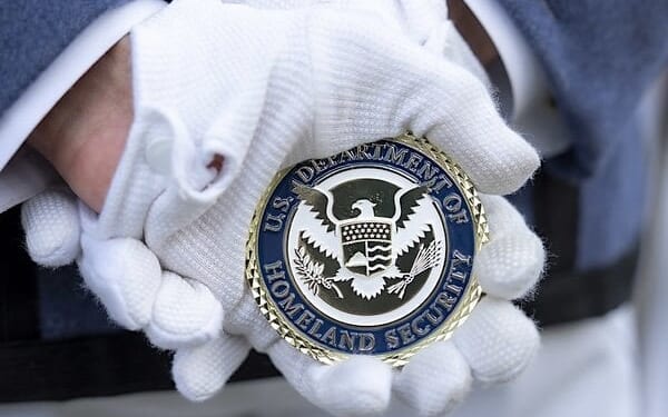 U.S. Secretary of Homeland Security Kristi Noem and The Citadel President Gen. Glenn Walters, USMC (Ret.), view the Corps of Cadets parade at The Citadel in Charleston, South Carolina, Friday, Nov. 7, 2025. (DHS photo by Tia Dufour)
