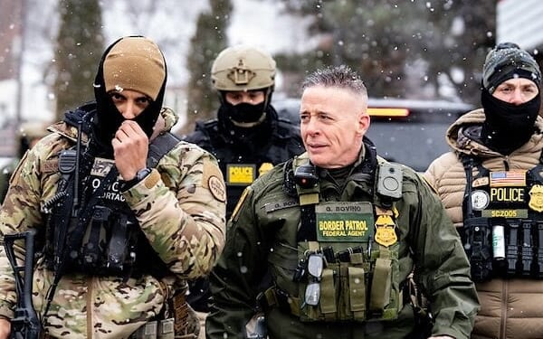 Border Patrol Commander Greg Bovino walks alongside BORTAC officers at a Speedway gas station in Minneapolis on Thursday, Jan. 22, 2026. ((Photo by Chad Davis)