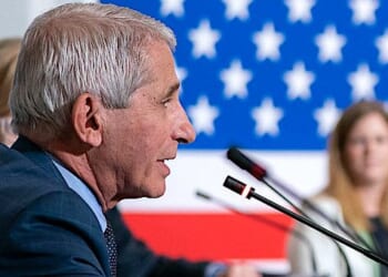 President Donald J. Trump listens as Dr. Anthony Fauci, Director of National Institute of Allergy and Infectious Diseases, addresses his remarks at a roundtable on donating plasma Thursday, July 30, 2020, at the American Red Cross-National Headquarters in Washington, D.C. (Official White House photo by Tia Dufour)