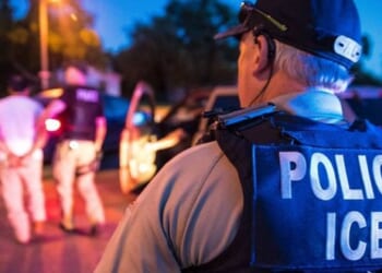 Enforcement and Removal Operations officers from U.S. Immigration and Customs Enforcement arrest a criminal fugitive on June 20, 2019