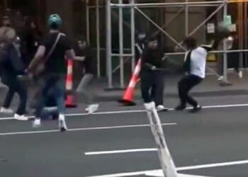 Migrants fight each other on streets of midtown Manhattan (video screenshot)