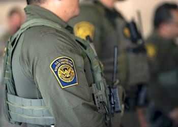 Secretary of Homeland Security Kristi Noem visits with officers from U.S. Immigration and Customs Enforcement, U.S. Customs and Border Protection, and the Federal Protective Service at the ICE facility in Portland, Oregon, to observe enforcement operations, Tuesday, Oct. 7, 2025. (DHS photo by Tia Dufour)