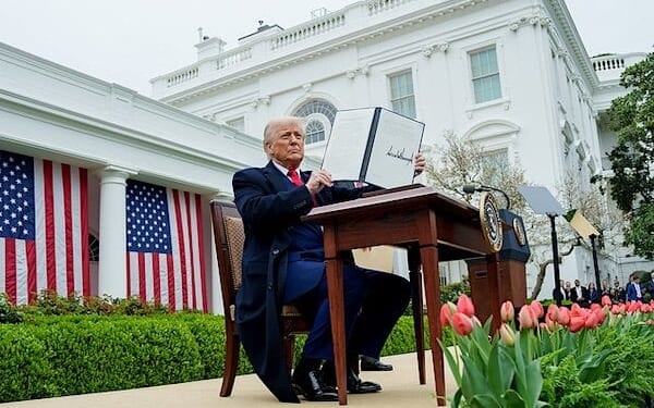 President Donald Trump signs new tariffs in the White House Rose Garden on Liberation Day, Wednesday, April 2, 2025 (Official White House photo)