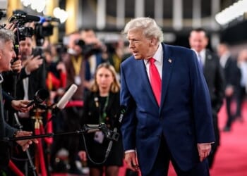 President Donald Trump speaks to members of the media after his arrival to the John F. Kennedy Center for the Performing Arts in Washington, D.C. on Friday, Dec. 5, 2025, to attend the FIFA World Cup drawing. (Official White House photo by Daniel Torok)