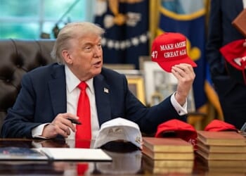 President Donald Trump exchanges gifts with German Chancellor Friedrich Merz, Thursday, June 5, 2025, in the Oval Office. (Official White House photo by Daniel Torok)