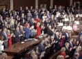 Republicans stand and applaud while Democrats remain seated during numerous moments in President Donald Trump