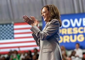 Kamala Harris walks onstage to deliver remarks with Joe Biden on the administration's efforts to lower prescription drug costs for Americans, Thursday, August 15, 2024, in Largo, Maryland. (Official White House photo by Lawrence Jackson)