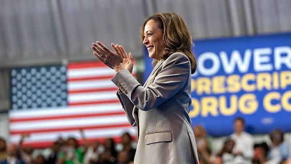 Kamala Harris walks onstage to deliver remarks with Joe Biden on the administration's efforts to lower prescription drug costs for Americans, Thursday, August 15, 2024, in Largo, Maryland. (Official White House photo by Lawrence Jackson)