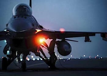 Airmen conduct a hot refueling on an Air Force F-16 Fighting Falcon aircraft at Al Udeid Air Base, Qatar, March 1, 2021, in order to rapidly redeployment to the U.S. Central Command’s area of responsibility. (U.S. Air National Guard photo by Staff Sgt. Jordan Martin)