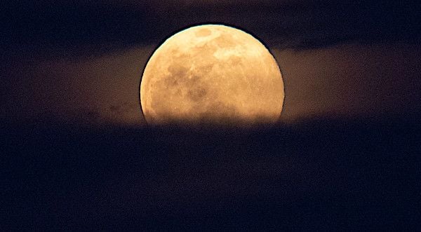 The Moon, or supermoon, is seen as it rises behind the U.S. Capitol, Monday, March 9, 2020, in Washington, D.C. A supermoon occurs when the Moon’s orbit is closest (perigee) to Earth. (NASA photo by Joel Kowsky)