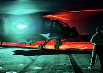 A UH-60 Black Hawk assigned to the Army's 16th Combat Aviation Brigade prepares to take off from the flight deck of the USS Ashland during deck-landing qualifications for Exercise Cobra Gold 26 in the Gulf of Thailand, Tuesday, Feb. 24, 2026. (U.S. Navy photo by Seaman Maliq J. Martin)