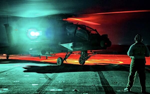 A UH-60 Black Hawk assigned to the Army's 16th Combat Aviation Brigade prepares to take off from the flight deck of the USS Ashland during deck-landing qualifications for Exercise Cobra Gold 26 in the Gulf of Thailand, Tuesday, Feb. 24, 2026. (U.S. Navy photo by Seaman Maliq J. Martin)