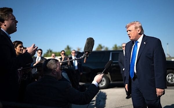 President Donald J. Trump boards Air Force One at Palm Beach International Airport in West Palm Beach, Florida on Monday, March 23, 2026, en route Memphis, Tennessee. (White House photo by Molly Riley)