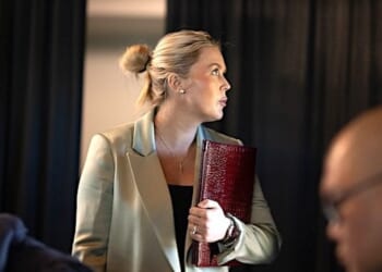 White House Press Secretary Karoline Leavitt listens as President Donald J. Trump oversees Operation Epic Fury at Mar-a-Lago, in Palm Beach, Florida, Sunday, March 1, 2026. (Official White House photo by Daniel Torok)