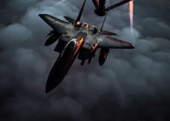 An Air Force F-15E Strike Eagle departs after receiving fuel from a KC-135 Stratotanker over Southwest Asia, Dec. 22, 2020. (U.S. Air Force photo by Staff Sgt. Trevor McBride)