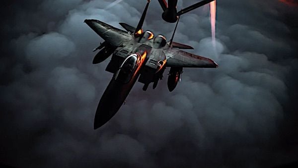 An Air Force F-15E Strike Eagle departs after receiving fuel from a KC-135 Stratotanker over Southwest Asia, Dec. 22, 2020. (U.S. Air Force photo by Staff Sgt. Trevor McBride)